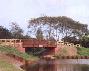 The footbridge under which boats enter the new waterway